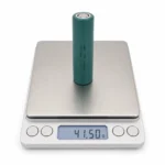 THOR 3.2V 1800mAh 18650 LiFePO4 battery cell on a digital scale showing 41.50 g