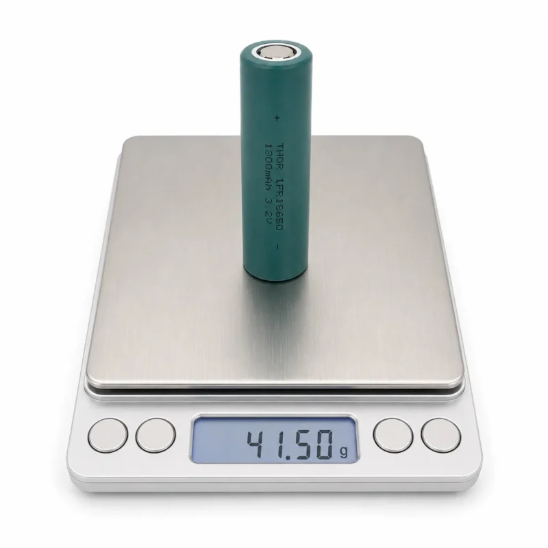 THOR 3.2V 1800mAh 18650 LiFePO4 battery cell on a digital scale showing 41.50 g